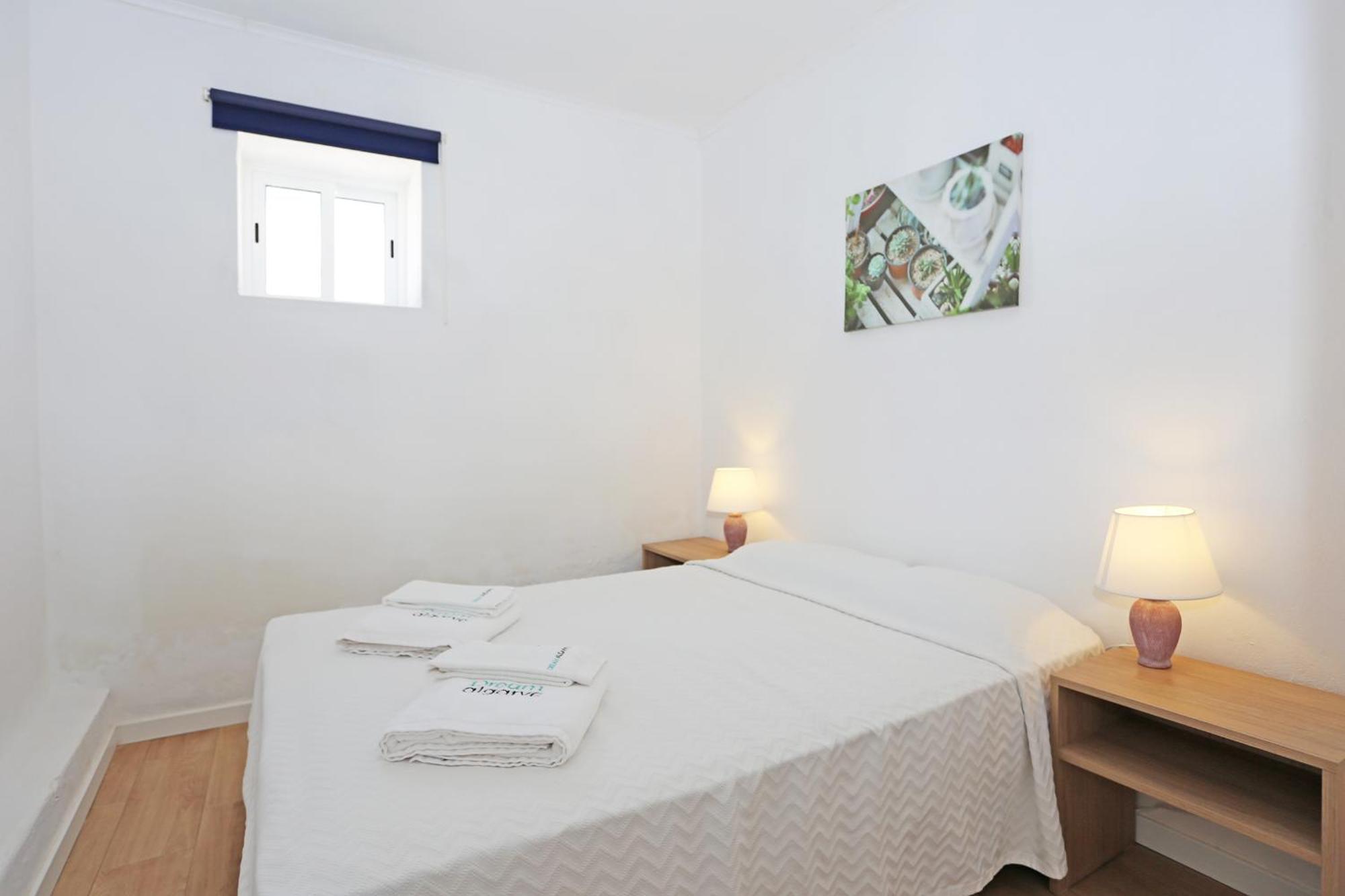 Ferienwohnung Quinta Da Ponte Odiáxere Zimmer foto